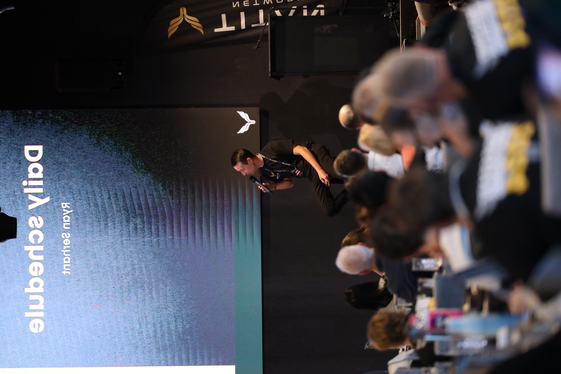 A speaker on the Titan stage