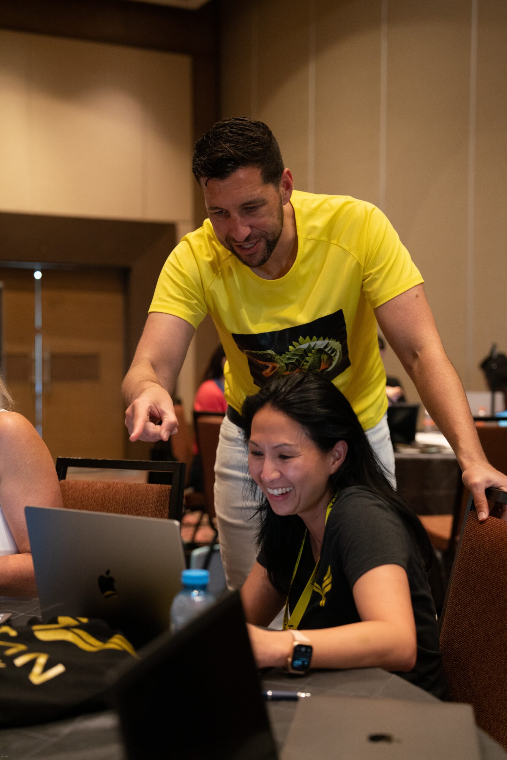 Professional coach leading an engaging workshop session during Titan 2023 coaching event, Day 4.