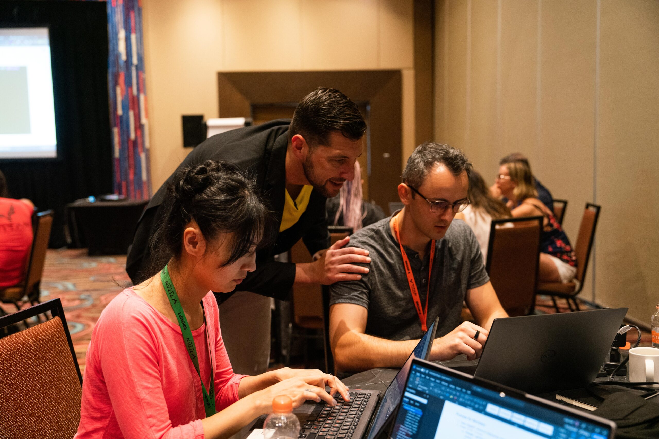 Professional coach leading an engaging workshop session during Titan 2023 Day 4 event.